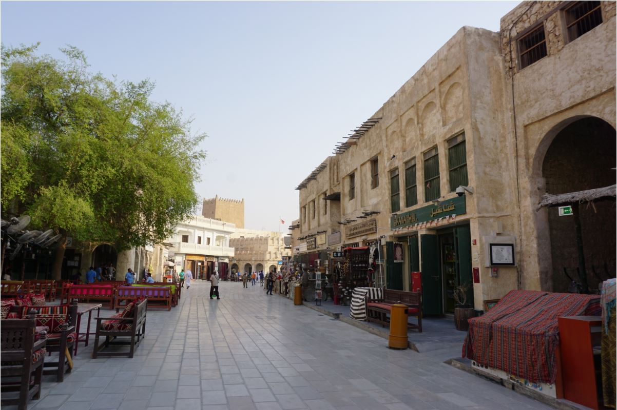 Chairs along the streets indicate that the shop is a restaurant